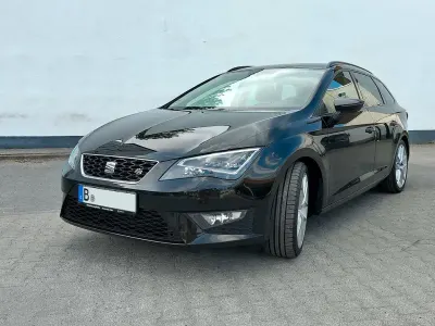 Używany Seat Leon ST FR 125 KM (91 kW) 2014 Czarny Kombi