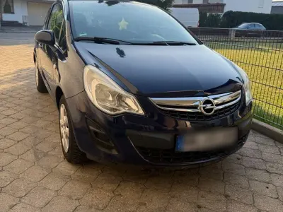 Gebraucht Opel Corsa Active 69 PS (50 kW) 2013 Blau Kleinwagen