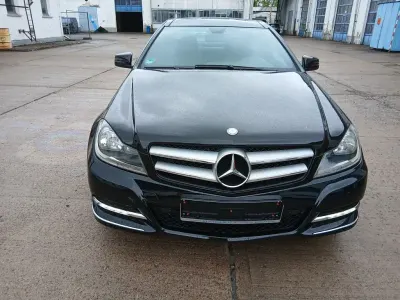 Używany Mercedes C180 156 KM (114 kW) 2013 Czarny Coupe