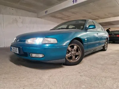 Gebraucht Mazda 626 163 PS (119 kW) 1997 Andere farben Limousine