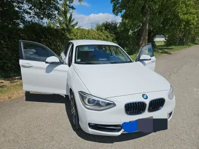 Używany BMW 116 Sport Line 136 KM (100 kW) 2012 Biały Hatchback