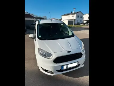 Gebraucht Ford Tourneo Courier Titanium 101 PS (74 kW) 2017 Weiß Van / Kleinbus