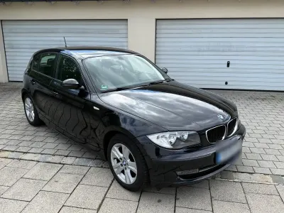 Gebraucht BMW 116 Lifestyle 122 PS (89 kW) 2009 Schwarz Kleinwagen