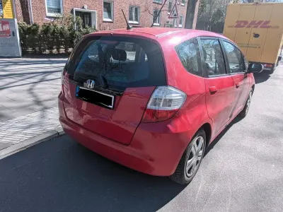 Second-hand Honda Jazz 99 CP (72 kW) 2009 Roșu Hatchback