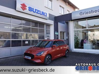 Gebraucht Suzuki Swift Comfort+ 83 PS (61 kW) 2025 Flame orange pearl metallic Kleinwagen