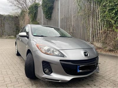 Second-hand Mazda 3 105 CP (77 kW) 2012 Argintiu Berlinǎ