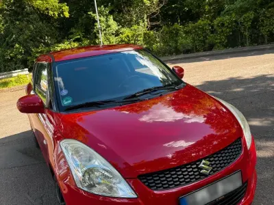 Gebraucht Suzuki Swift 94 PS (69 kW) 2012 Rot Kleinwagen