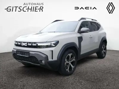 Gebraucht Dacia Duster Journey 131 PS (96 kW) 2025 Sandstone (beige) SUV