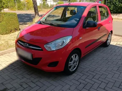 Gebraucht Hyundai i10 67 PS (49 kW) 2012 Rot Kleinwagen