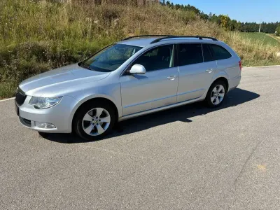 Używany Skoda Superb Ambition 170 KM (125 kW) 2012 Srebrny Kombi