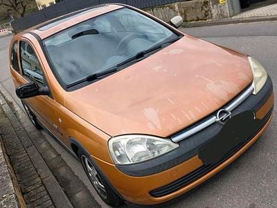 Second-hand Opel Corsa 58 CP (42 kW) 2003 Portocaliu Hatchback