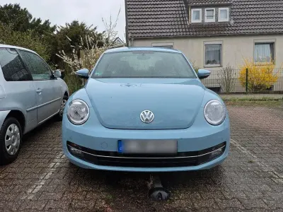 Używany VW Beetle Design 105 KM (77 kW) 2014 Niebieski Hatchback