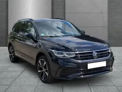 Gebraucht VW Tiguan Allspace R-line 245 PS (180 kW) 2024 Deep black perleffekt (metallic) SUV