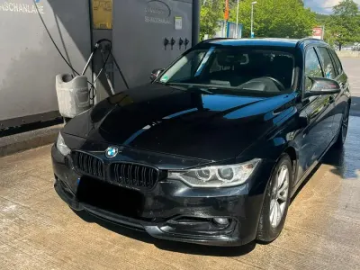 Gebraucht BMW 320 Sport Line 184 PS (135 kW) 2012 Schwarz Kombi
