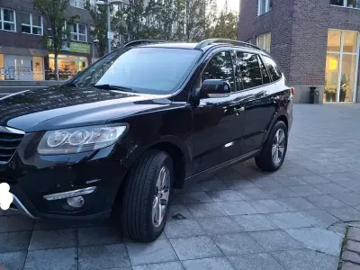 Gebraucht Hyundai Santa Fe 197 PS (144 kW) 2012 Schwarz SUV