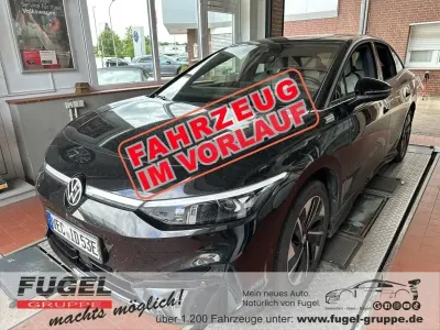 Gebraucht VW ID.7 Pro 210 kW (286 PS) 2023 Grenadillschwarz metallic Kleinwagen