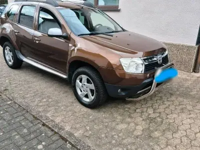 Używany Dacia Duster Prestige 105 KM (77 kW) 2011 Brązowy SUV