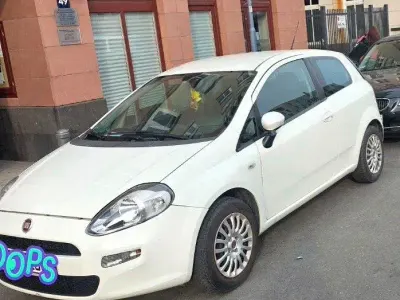 Gebraucht Fiat Grande Punto 94 PS (69 kW) 2014 Weiß Kleinwagen