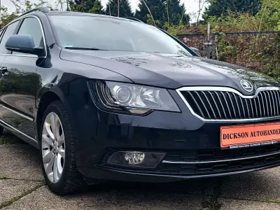Używany Skoda Superb Exclusive 170 KM (125 kW) 2015 Czarny Kombi