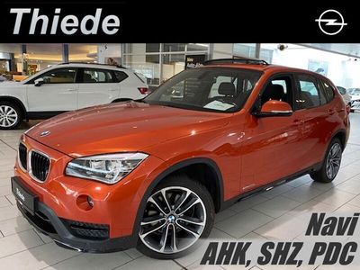 Gebraucht BMW X1 Shadowline 184 PS (135 kW) 2014 Valencia orange metallic SUV