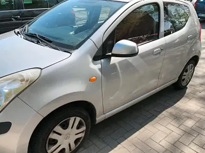 Gebraucht Nissan Pixo 69 PS (50 kW) 2010 Grau Kleinwagen