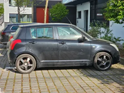 Używany Suzuki Swift Comfort 92 KM (67 kW) 2005 Czarny Hatchback