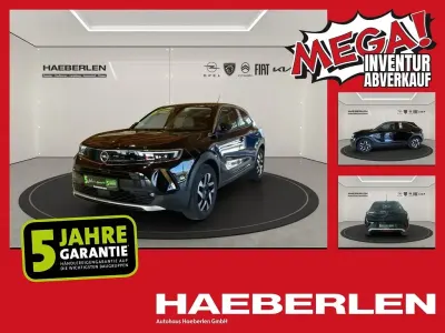 Gebraucht Opel Mokka Elegance 101 PS (74 kW) 2023 Diamant schwarz/karbon schwarz (metallic) SUV