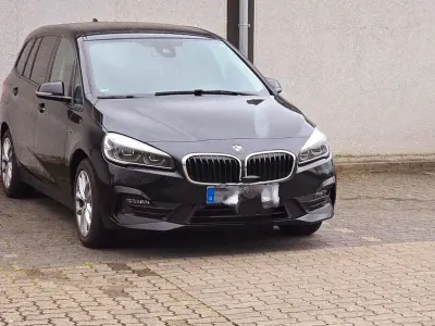 Gebraucht BMW 218 Gran Tourer Sport Line 150 PS (110 kW) 2019 Schwarz Van / Kleinbus