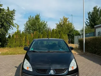 Gebraucht Mitsubishi Colt 101 PS (74 kW) 2007 Schwarz Cabrio