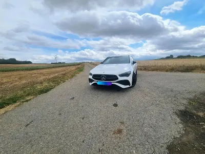 Gebraucht Mercedes CLA200 AMG line 163 PS (119 kW) 2023 Weiß Coupé