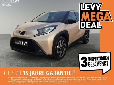 Gebraucht Toyota Aygo X Comfort 72 PS (52 kW) 2023 Ginger beige metallic/ night sky black SUV
