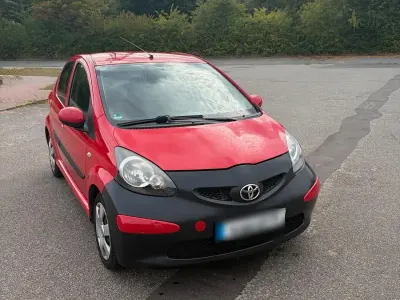 Gebraucht Toyota Aygo 67 PS (49 kW) 2007 Rot Kleinwagen