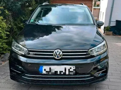 Używany VW Touran R-line 150 KM (110 kW) 2017 Czarny Minivan