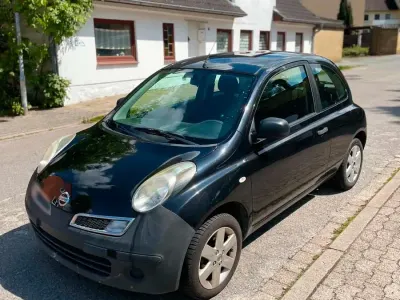 Gebraucht Nissan Micra 75 PS (55 kW) 2010 Schwarz Kleinwagen