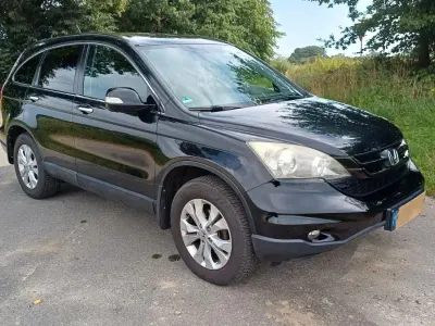 Käytetty Honda CR-V Comfort 150 HP (110 kW) 2012 Musta Katumaasturi