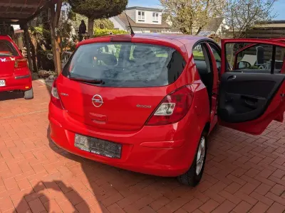 Gebraucht Opel Corsa Innovation 69 PS (50 kW) 2011 Rot Kleinwagen