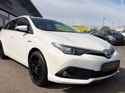Gebraucht Toyota Auris Hybrid 99 PS (72 kW) 2017 Super (pure) white ii Kombi