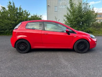 Gebraucht Fiat Grande Punto 69 PS (50 kW) 2012 Rot Kleinwagen