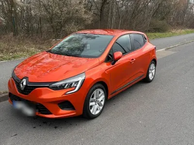 Używany Renault Clio V Zen 140 KM (102 kW) 2021 Pomarańczowy Sedan/Limuzyna