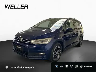 Gebraucht VW Touran Comfortline 150 PS (110 kW) 2023 Stormgreypalladium (grau) Van / Kleinbus