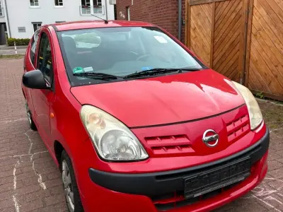 Gebraucht Nissan Pixo 68 PS (50 kW) 2010 Rot Kleinwagen