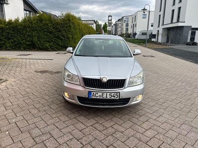 Second-hand Skoda Octavia Ambiente 105 CP (77 kW) 2010 Argintiu Break