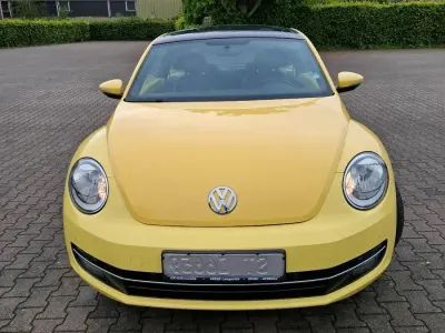 Używany VW Beetle 105 KM (77 kW) 2011 Żółty Hatchback