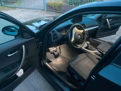 Gebraucht BMW 116 122 PS (89 kW) 2006 Schwarz Kleinwagen