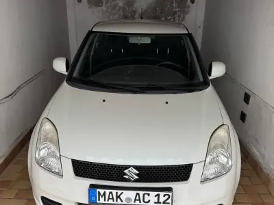Używany Suzuki Swift 92 KM (67 kW) 2007 Biały Hatchback