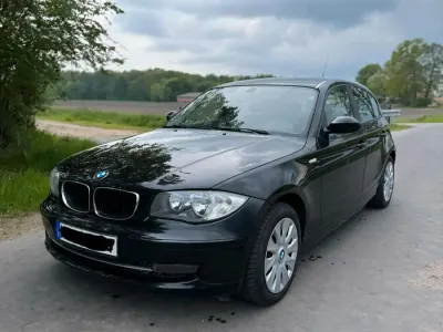 Gebraucht BMW 116 122 PS (89 kW) 2009 Schwarz Kleinwagen