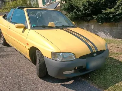 Gebraucht Ford Escort Cabriolet 115 PS (84 kW) 1996 Gelb Cabrio