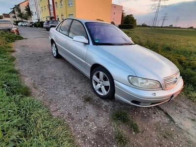 Second-hand Opel Omega 144 CP (105 kW) 2001 Argintiu Berlinǎ