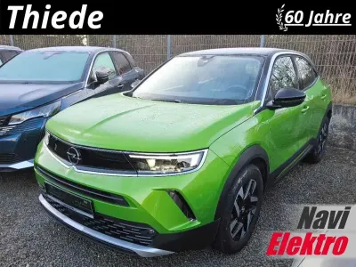 Gebraucht Opel Mokka-e Elegance 100 kW (136 PS) 2022 Matcha grün metallic SUV