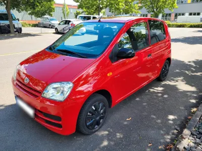 Gebraucht Daihatsu Cuore 58 PS (42 kW) 2006 Rot Kleinwagen